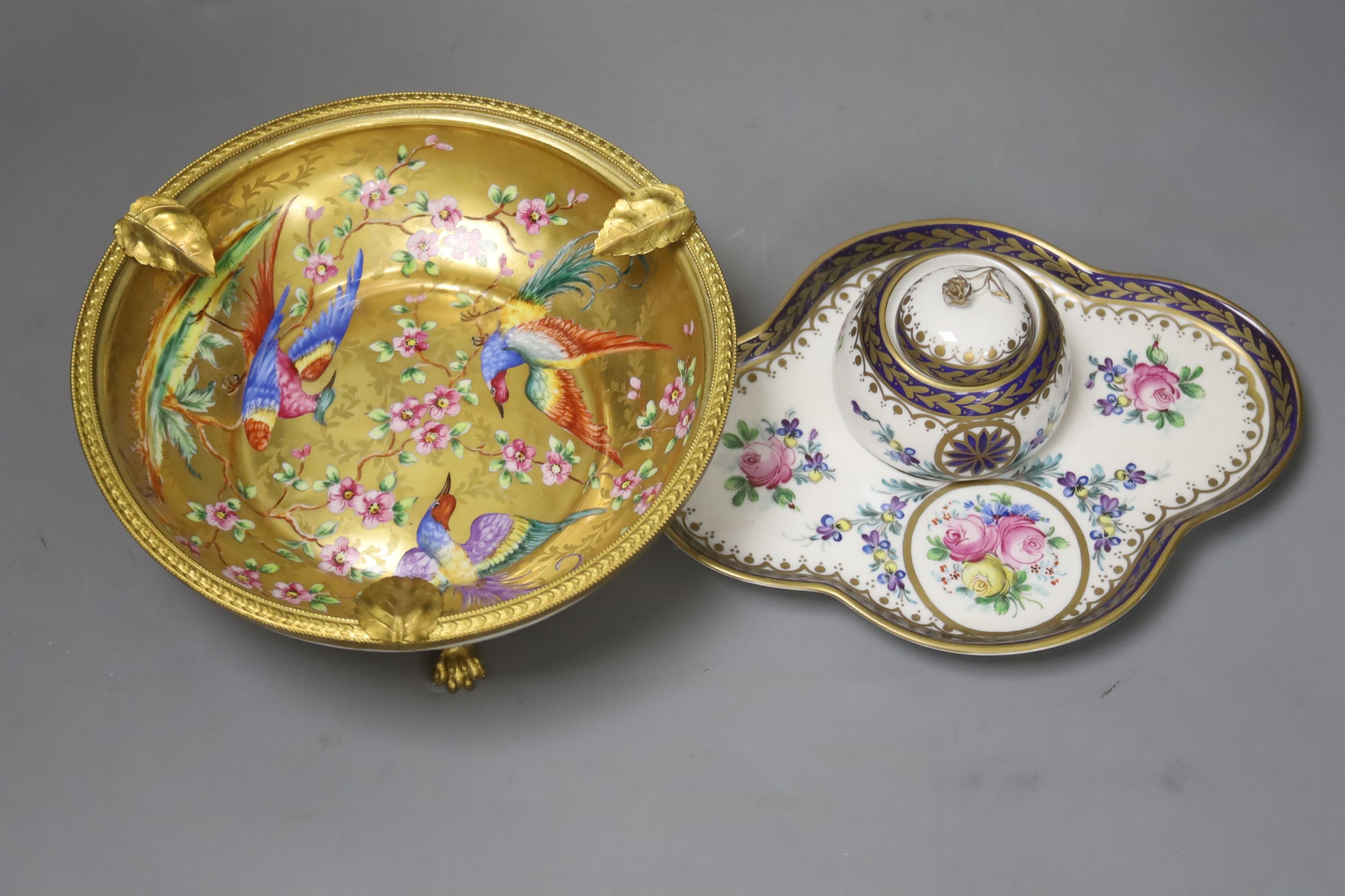 A Paris porcelain box and cover, c.1890, a pair Paris porcelain vases, a similar ‘fantastic birds’ bowl and a Dresden inkwell and height 25cm